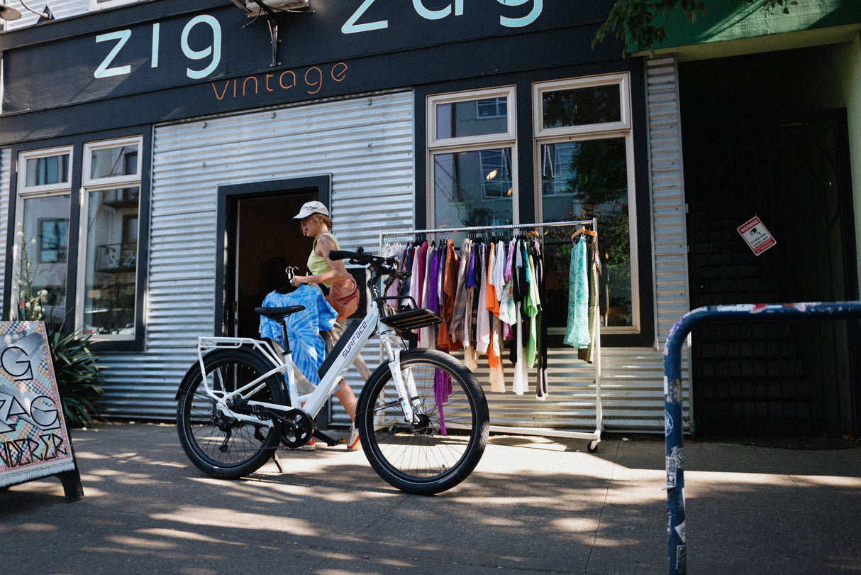 SURFACE604 - V Rook Low Step 500W Commuter in front of vintage clothing store.