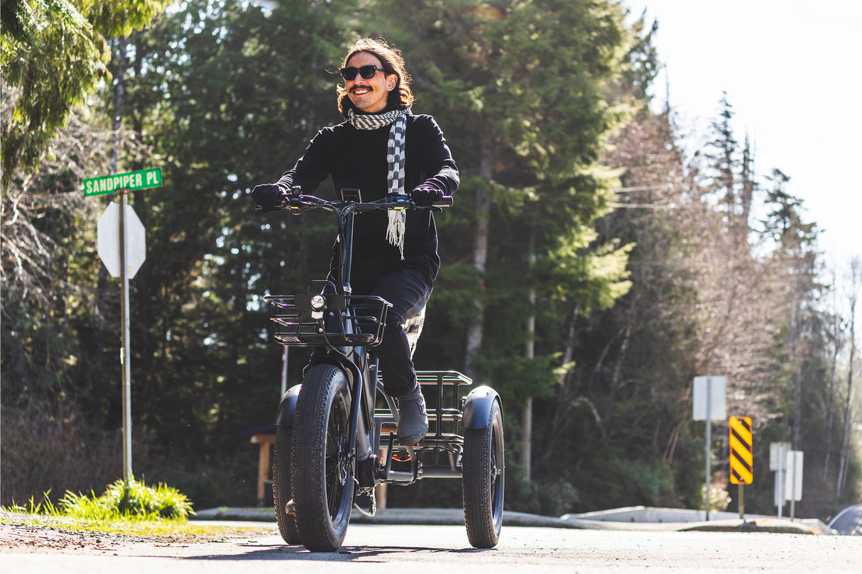 Surface 604 Trio Folding eTrike being ridden down the road.