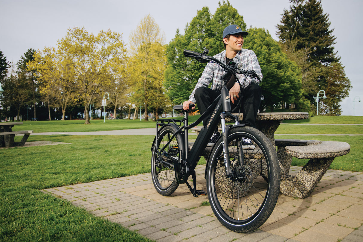 Surface 604 Colt 36V Version w/ High-Step Frame leaning on a park bench.